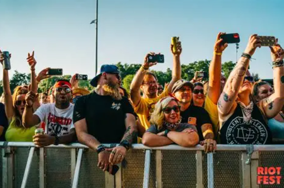 Crowd enjoying live performances at Riot Fest 2026 in Chicago