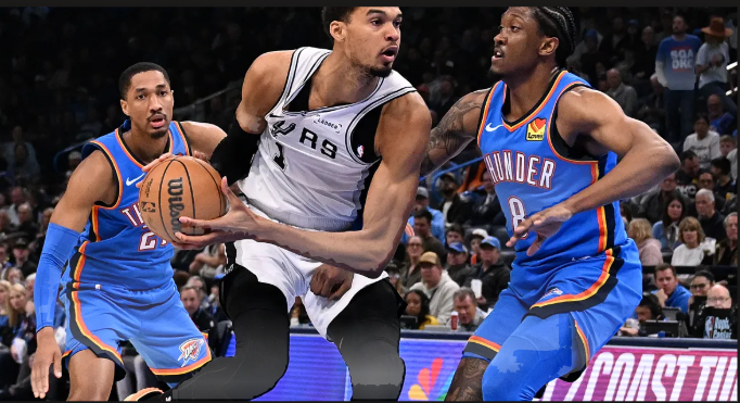 San Antonio Spurs and Oklahoma City Thunder players competing during intense NBA playoff Game 6